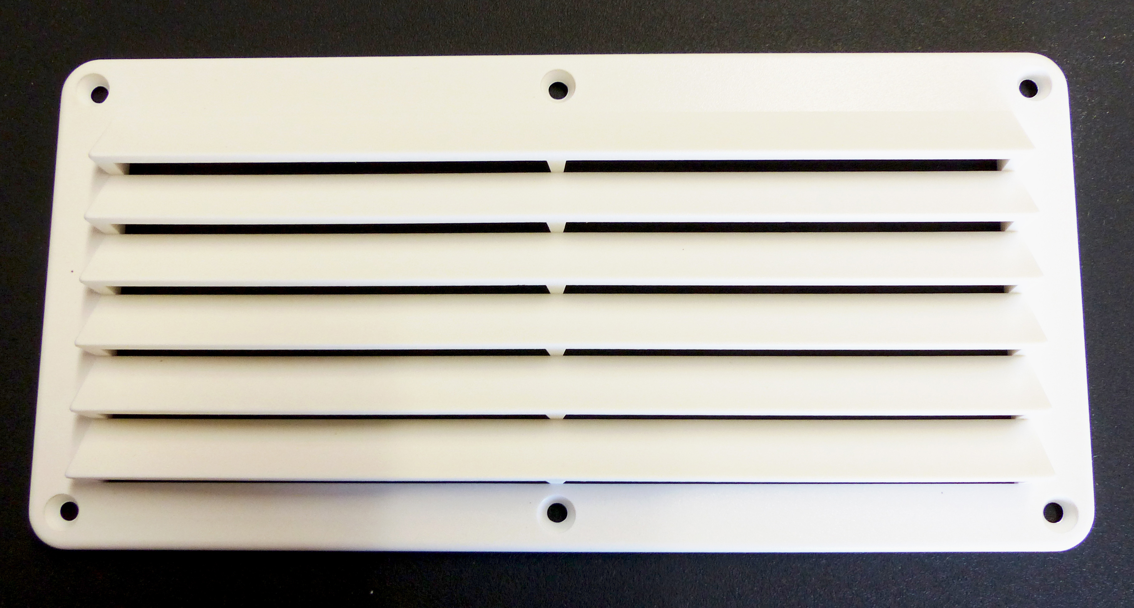 white plastic vent front view